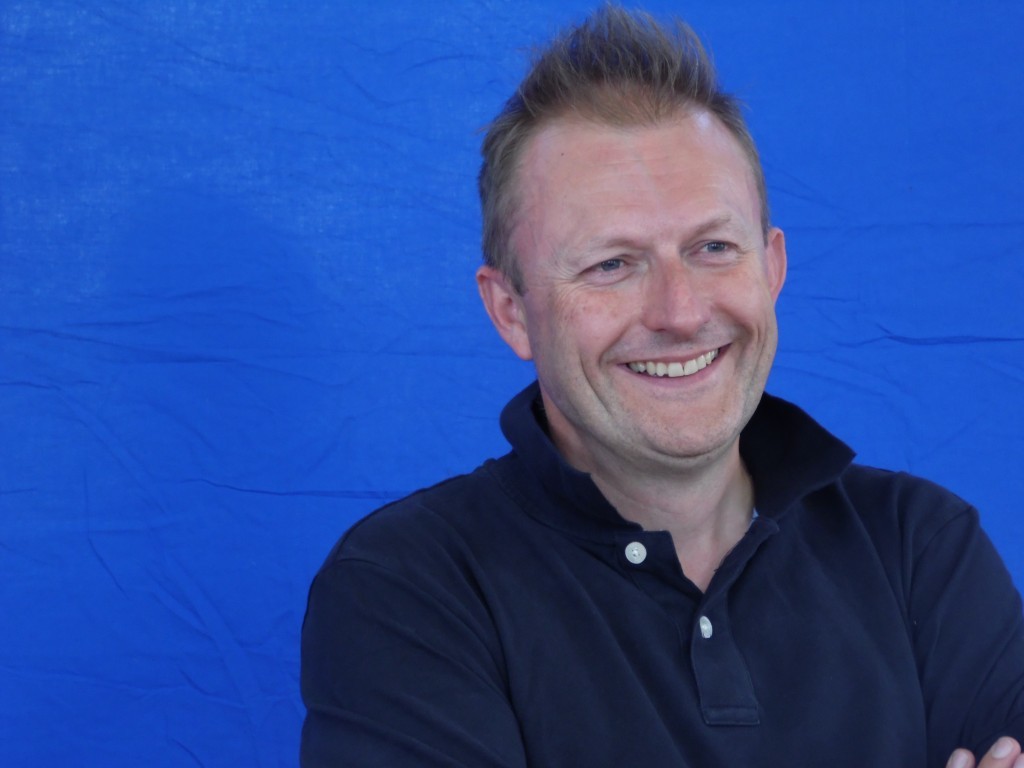 authors-picture-head-shoulders-blue-screen-1024x768